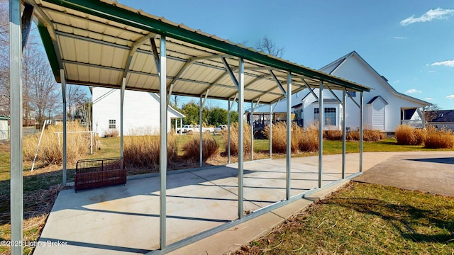 view of patio / terrace featuring a carport