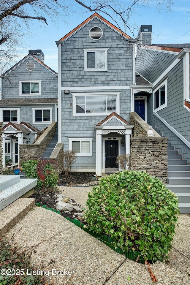 shingle-style home with a chimney