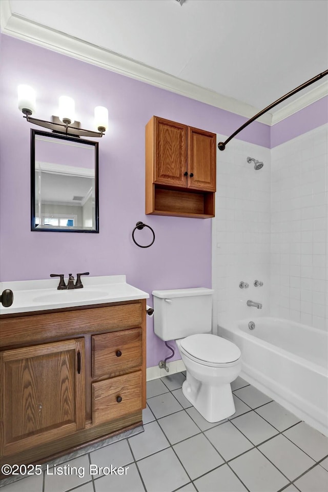 full bath with toilet, vanity, crown molding, and tile patterned floors