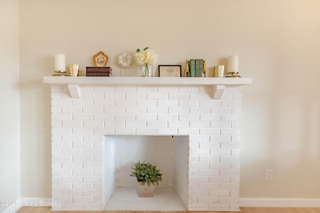 interior details featuring a fireplace