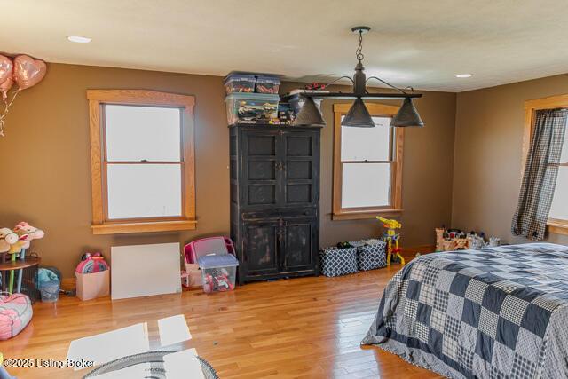 bedroom with wood finished floors