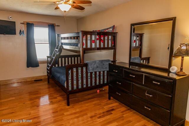 bedroom featuring light wood-style flooring