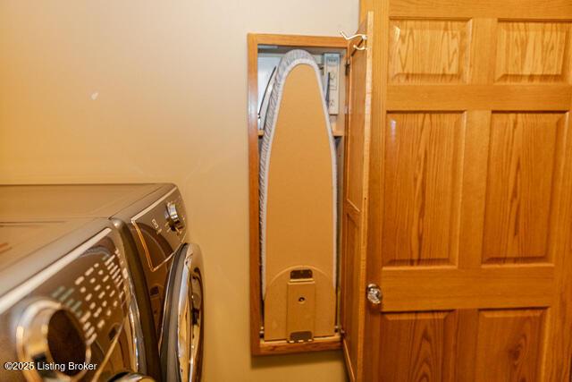 clothes washing area with laundry area and washing machine and dryer
