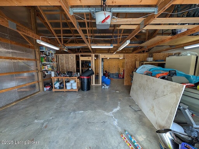 garage featuring a garage door opener