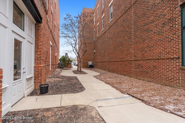 exterior space featuring a patio area and cooling unit