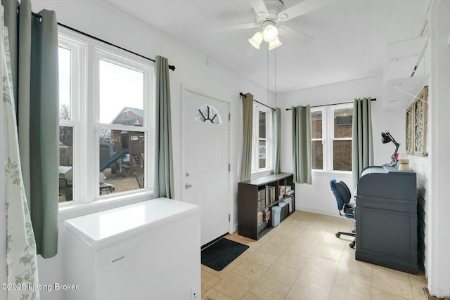 office area with ceiling fan