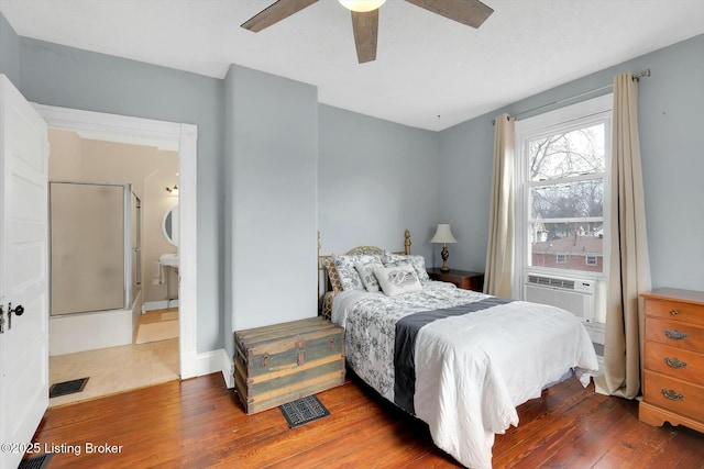 bedroom with visible vents, cooling unit, a ceiling fan, and wood finished floors