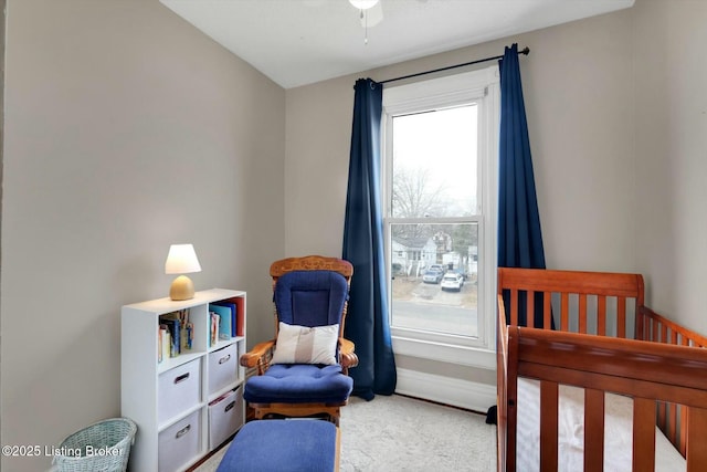 bedroom featuring baseboards and carpet floors