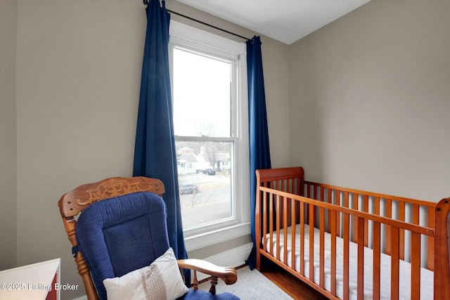 bedroom with a nursery area