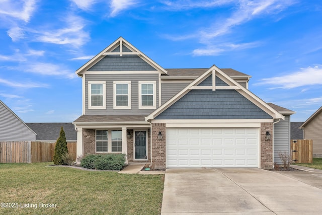 craftsman inspired home with driveway, a front lawn, and fence