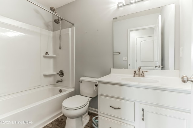 bathroom with vanity, toilet, and bathing tub / shower combination