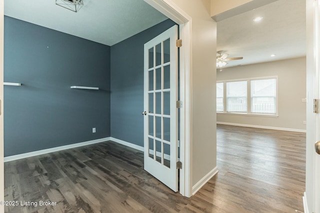 unfurnished room with a ceiling fan, recessed lighting, baseboards, and wood finished floors