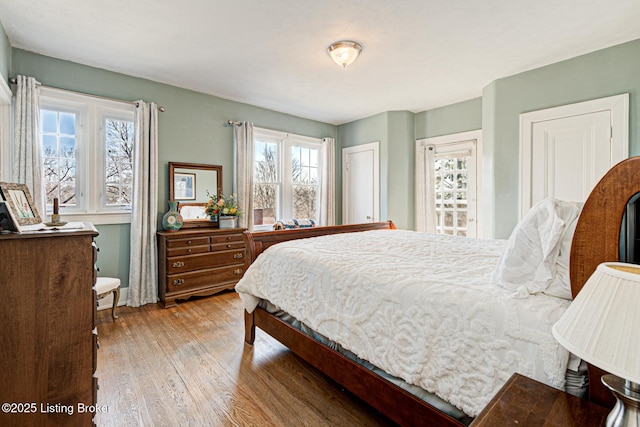 bedroom with wood finished floors