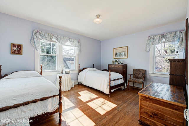 bedroom featuring wood finished floors
