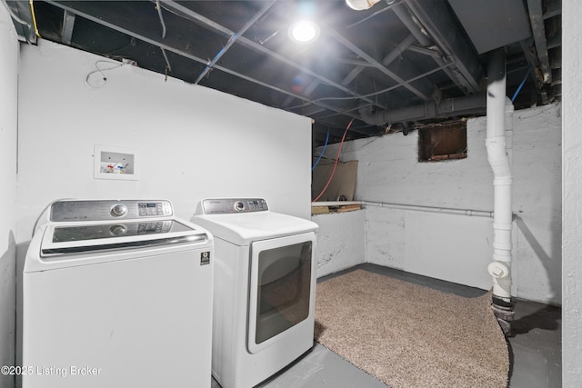 laundry area featuring laundry area and independent washer and dryer