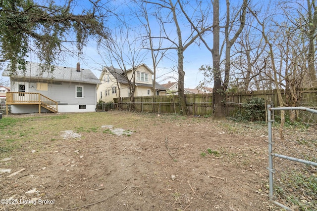 view of yard with a fenced backyard