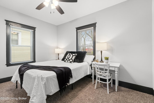 bedroom with ceiling fan, carpet, and baseboards