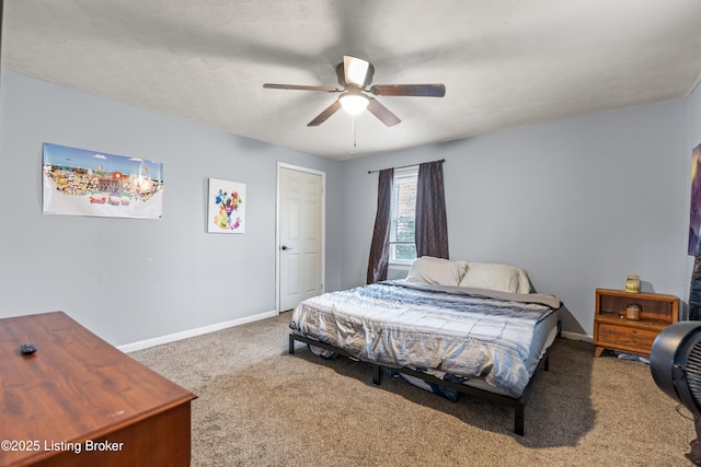 bedroom featuring carpet floors, a ceiling fan, and baseboards