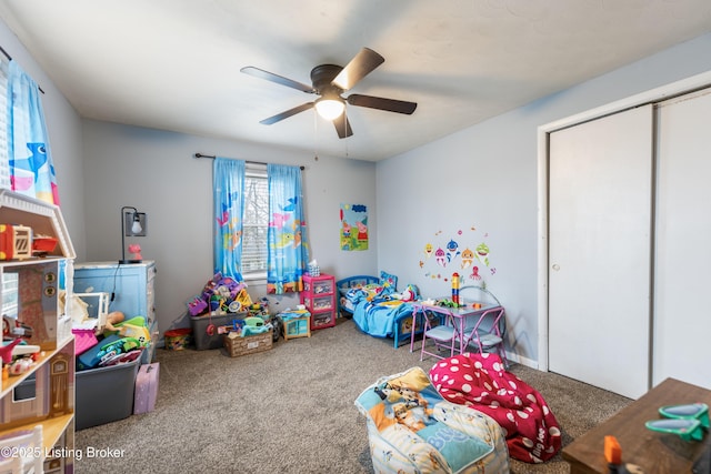 recreation room featuring carpet floors and a ceiling fan