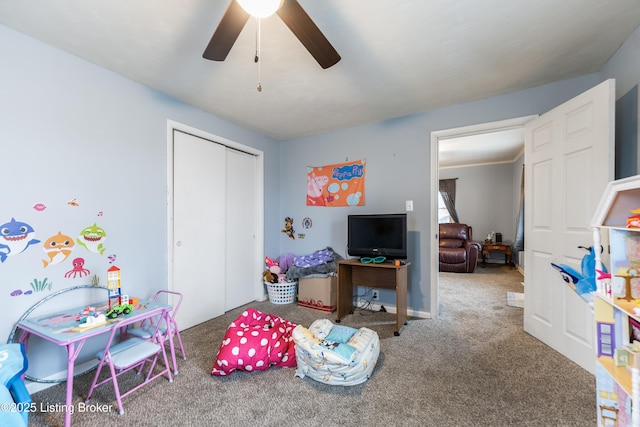 game room featuring a ceiling fan and carpet flooring