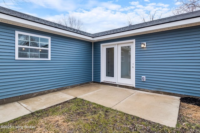 property entrance with a patio