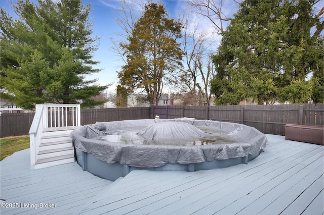 deck featuring a fenced backyard