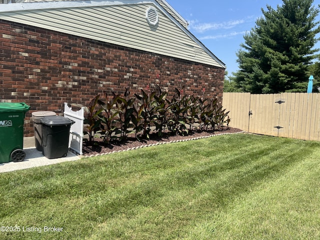 view of yard featuring fence