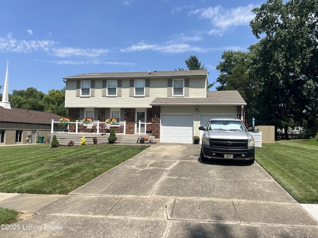 view of front of house with a front lawn, brick siding, covered porch, and driveway