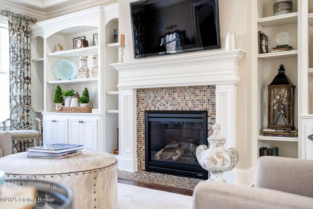 room details with built in features and a tiled fireplace