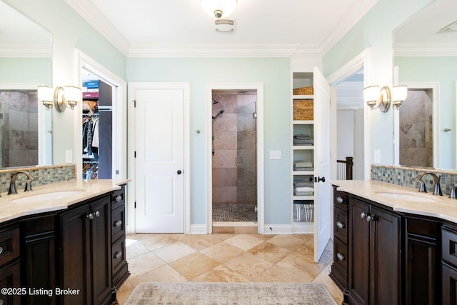 full bathroom featuring tasteful backsplash, a stall shower, and a sink