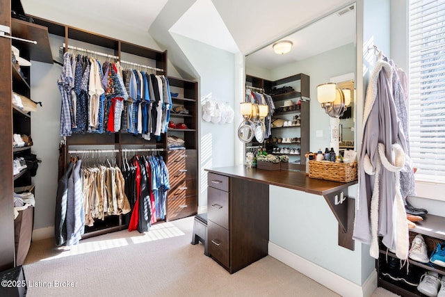 spacious closet featuring carpet and visible vents