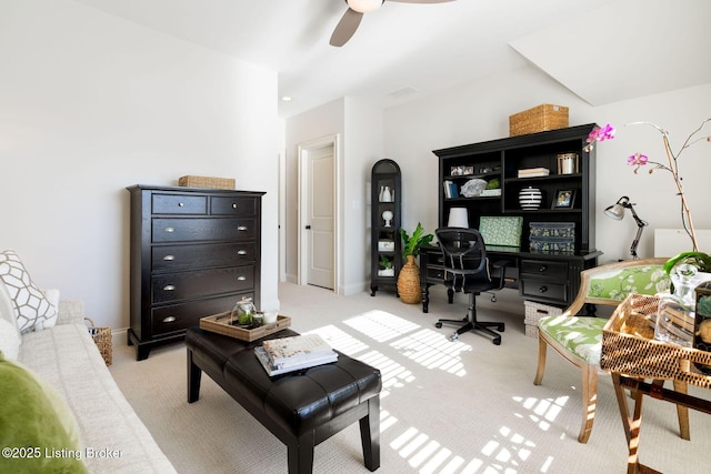 office with baseboards, a ceiling fan, and light colored carpet