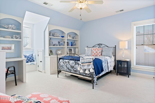 bedroom featuring carpet floors, visible vents, and ceiling fan