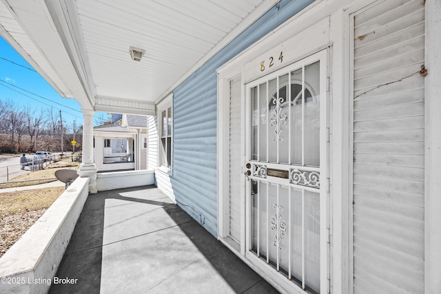 balcony featuring a porch