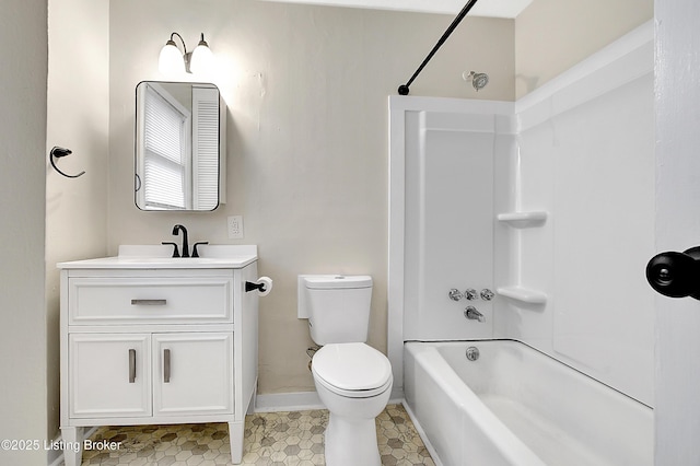 bathroom featuring shower / bathtub combination, vanity, toilet, and baseboards