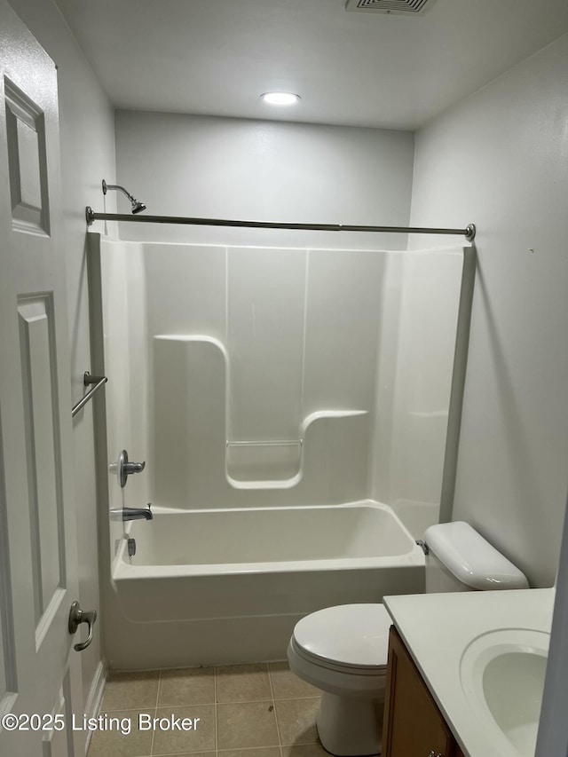 full bath featuring toilet, shower / bath combination, visible vents, vanity, and tile patterned floors