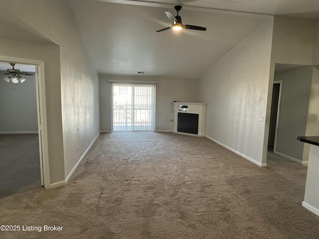 unfurnished living room featuring high vaulted ceiling, carpet floors, a fireplace, a ceiling fan, and baseboards