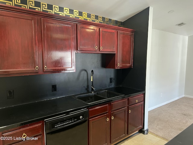 kitchen with black dishwasher, dark countertops, visible vents, a sink, and dark brown cabinets