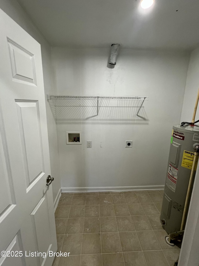 laundry area featuring hookup for a washing machine, electric water heater, hookup for an electric dryer, laundry area, and baseboards