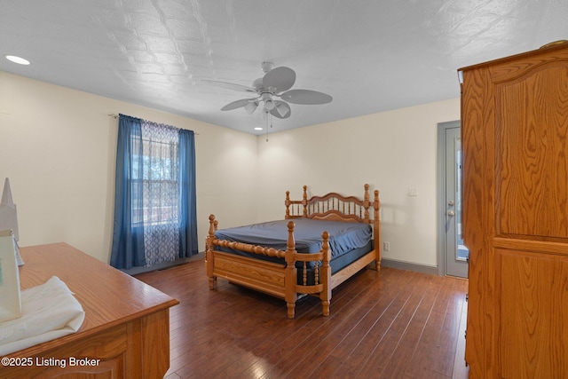 bedroom with recessed lighting, dark wood-style flooring, ceiling fan, and baseboards