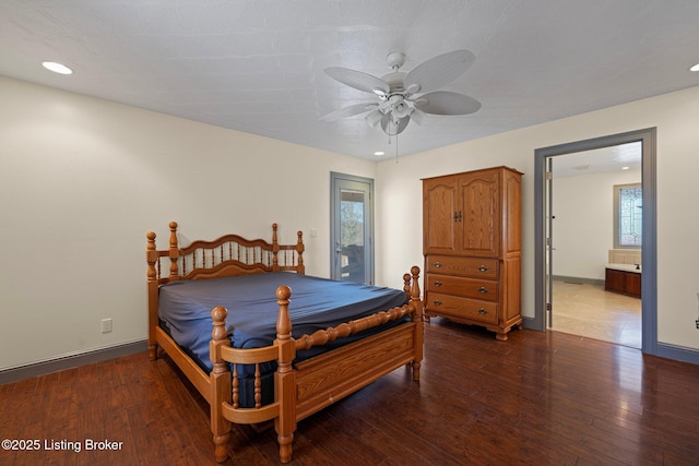 bedroom featuring recessed lighting, a ceiling fan, connected bathroom, baseboards, and hardwood / wood-style flooring