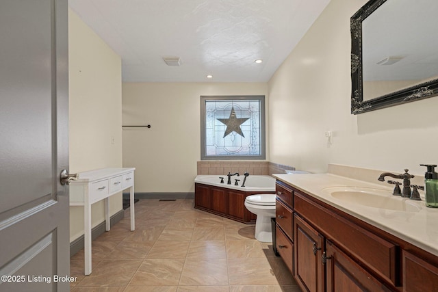 full bathroom featuring a garden tub, recessed lighting, visible vents, toilet, and vanity