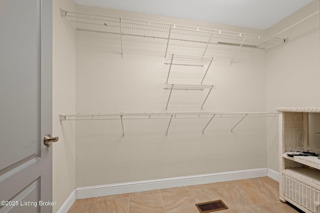 walk in closet featuring visible vents