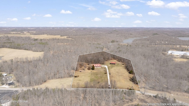 birds eye view of property with a rural view