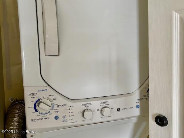 1515 La Fontenay Ct, Louisville, KY 40223 - washroom with stacked washing maching and dryer and water heater