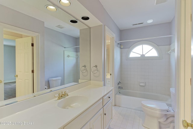 bathroom with visible vents, toilet, tile patterned flooring, tub / shower combination, and vanity