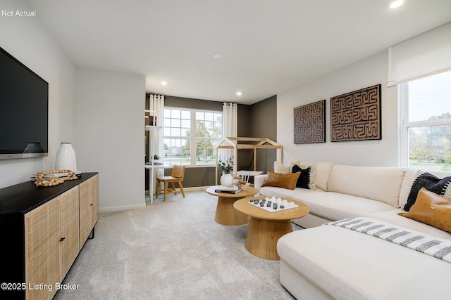 living room with light carpet, baseboards, and recessed lighting