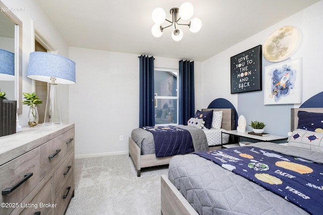 bedroom featuring light carpet, baseboards, and a notable chandelier