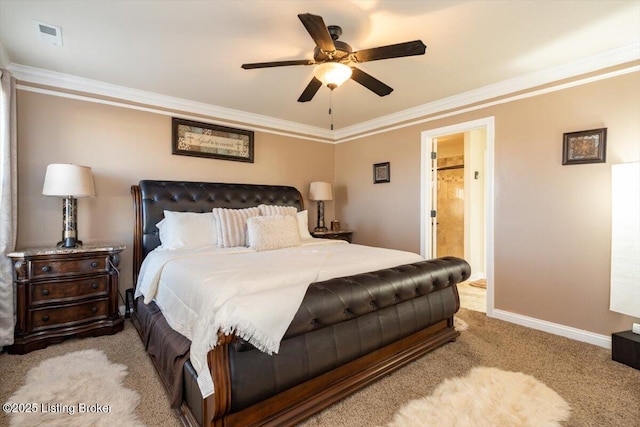 carpeted bedroom featuring ensuite bathroom, crown molding, baseboards, and ceiling fan