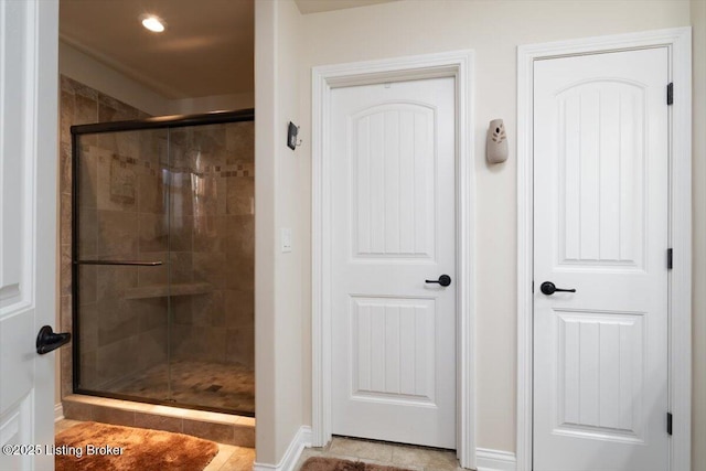 full bath featuring a shower stall